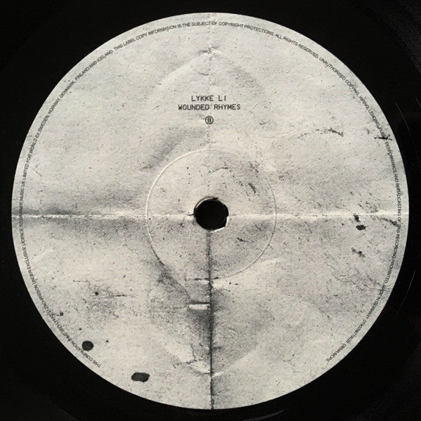 wounded-rhymes-(anniversary-edition)