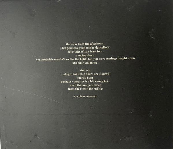 arctic-monkeys-–-whatever-people-say-i-am,-thats-what-im-not