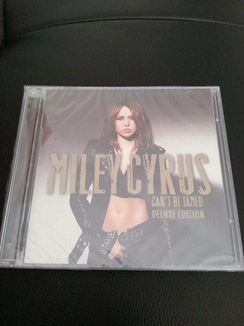 miley-cyrus-–-cant-be-tamed