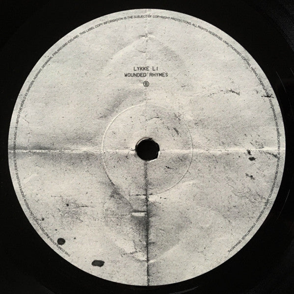 wounded-rhymes-(anniversary-edition)